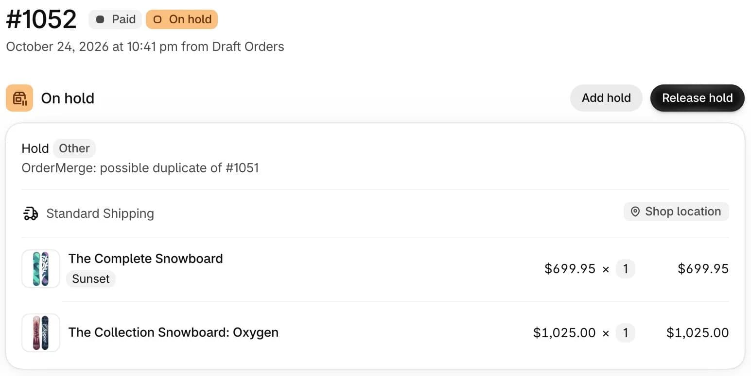 Shopify order #1052 on hold, with the hold note OrderMerge: possible duplicate of #1051